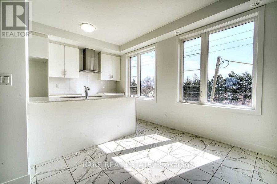 66 Carole Bell Way, Markham, Ontario  L6E 0W2 - Photo 5 - N12892098