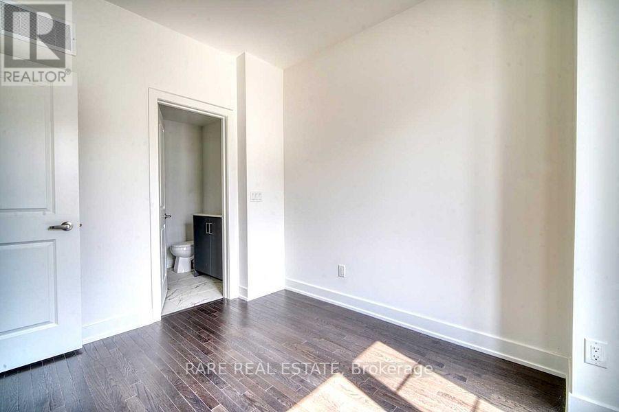 66 Carole Bell Way, Markham, Ontario  L6E 0W2 - Photo 6 - N12892098