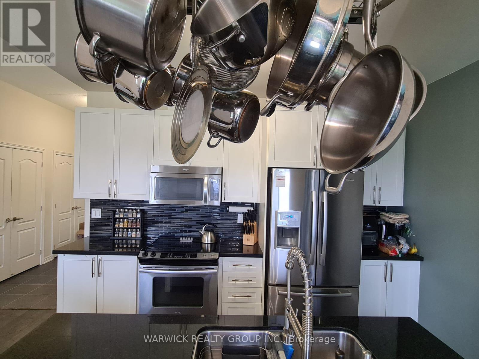 605 - 1419 Costigan Road, Milton, Ontario  L9T 0Y7 - Photo 4 - W12892572