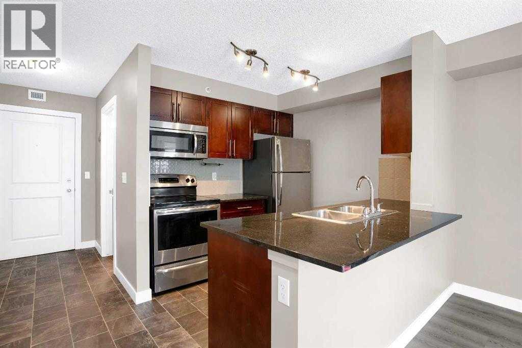 9407, 403 Mackenzie Way Sw, Airdrie, Alberta  T4B 3V7 - Photo 6 - A2293383