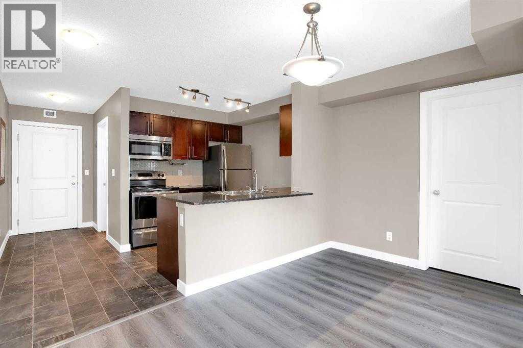 9407, 403 Mackenzie Way Sw, Airdrie, Alberta  T4B 3V7 - Photo 5 - A2293383