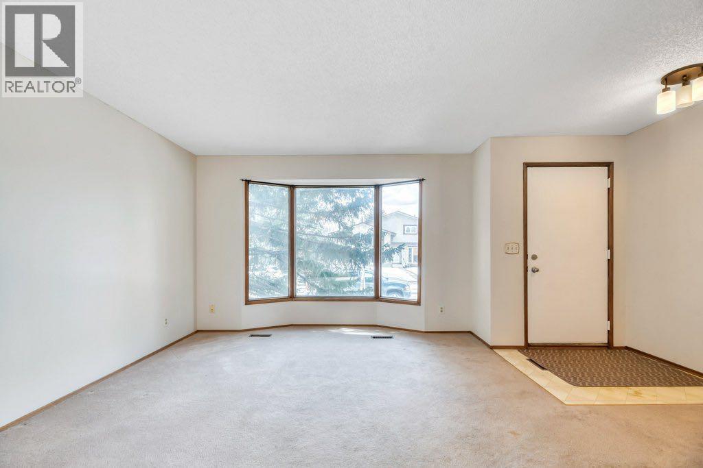 56 Cedarwood Hill Sw, Calgary, Alberta  T2W 3H5 - Photo 12 - A2291326