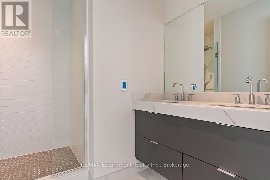 201 - 123 Maurice Drive, Oakville, Ontario  L6K 2W6 - Photo 24 - W12883416