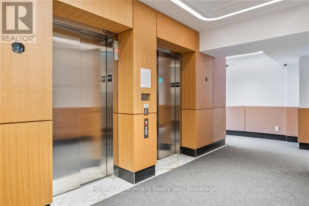 201 - 123 Maurice Drive, Oakville, Ontario  L6K 2W6 - Photo 9 - W12883416