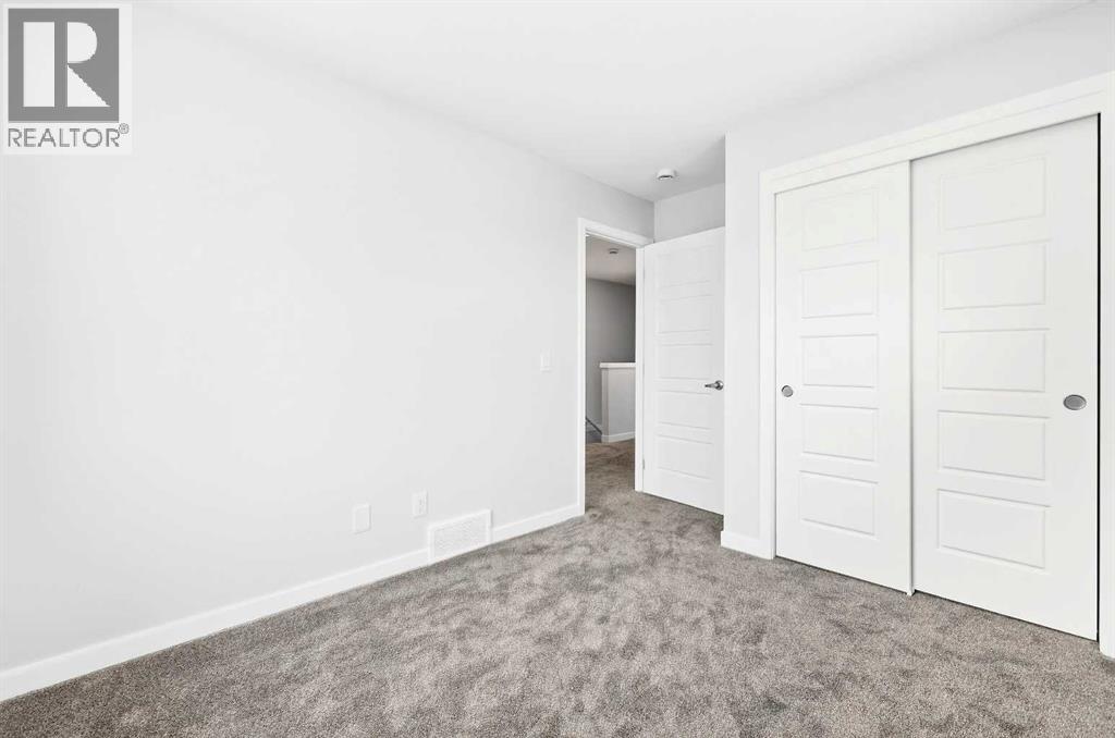 101, 40 Creekside Way SW, Calgary, Alberta  T2X 6E2 - Photo 25 - A2292923