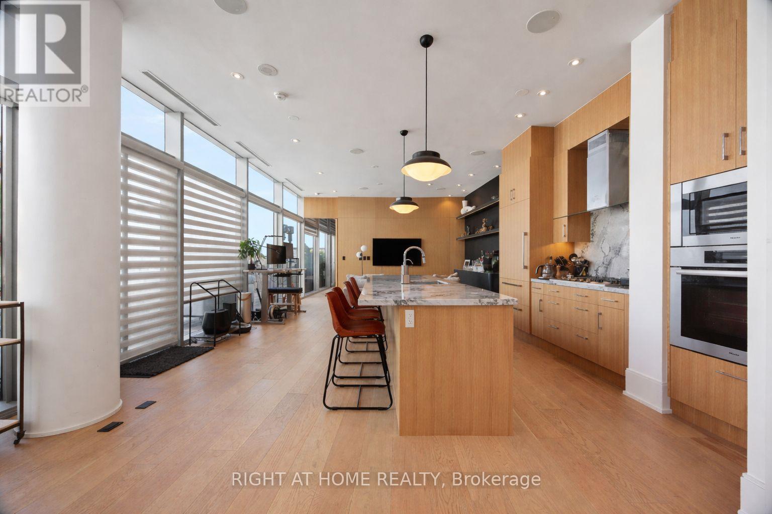 1202 - 39 Queens Quay E, Toronto (Waterfront Communities), Ontario  M5E 0A5 - Photo 7 - C12893588