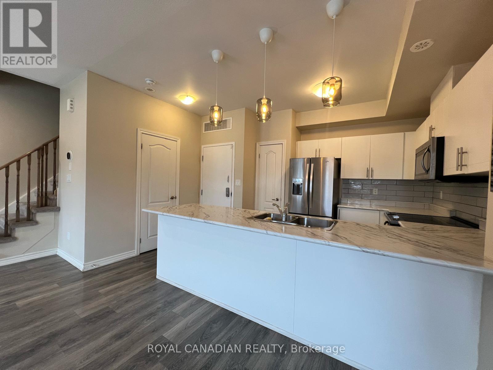 40-02 - 2420 Baronwood Drive, Oakville (Wm Westmount), Ontario  L6M 0X6 - Photo 3 - W12893550