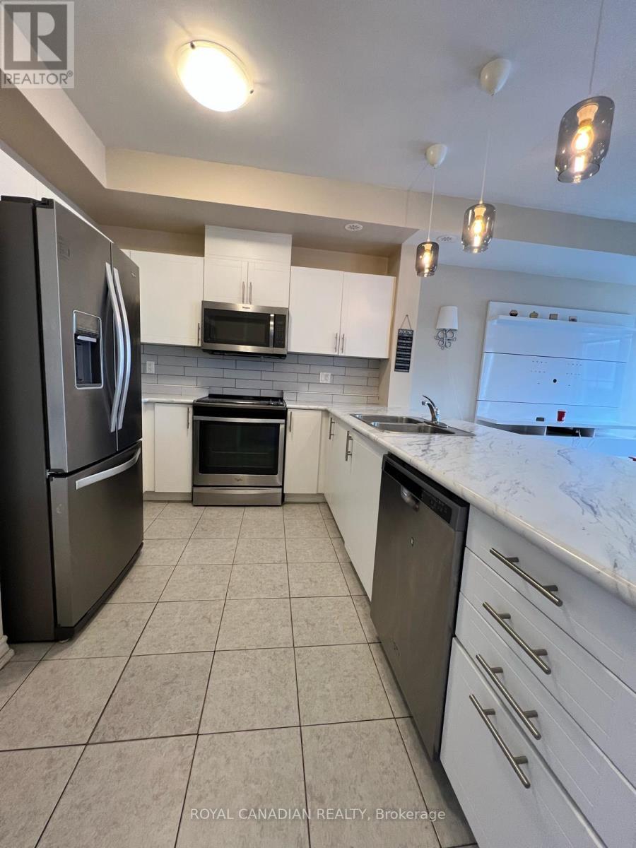 40-02 - 2420 Baronwood Drive, Oakville (Wm Westmount), Ontario  L6M 0X6 - Photo 4 - W12893550