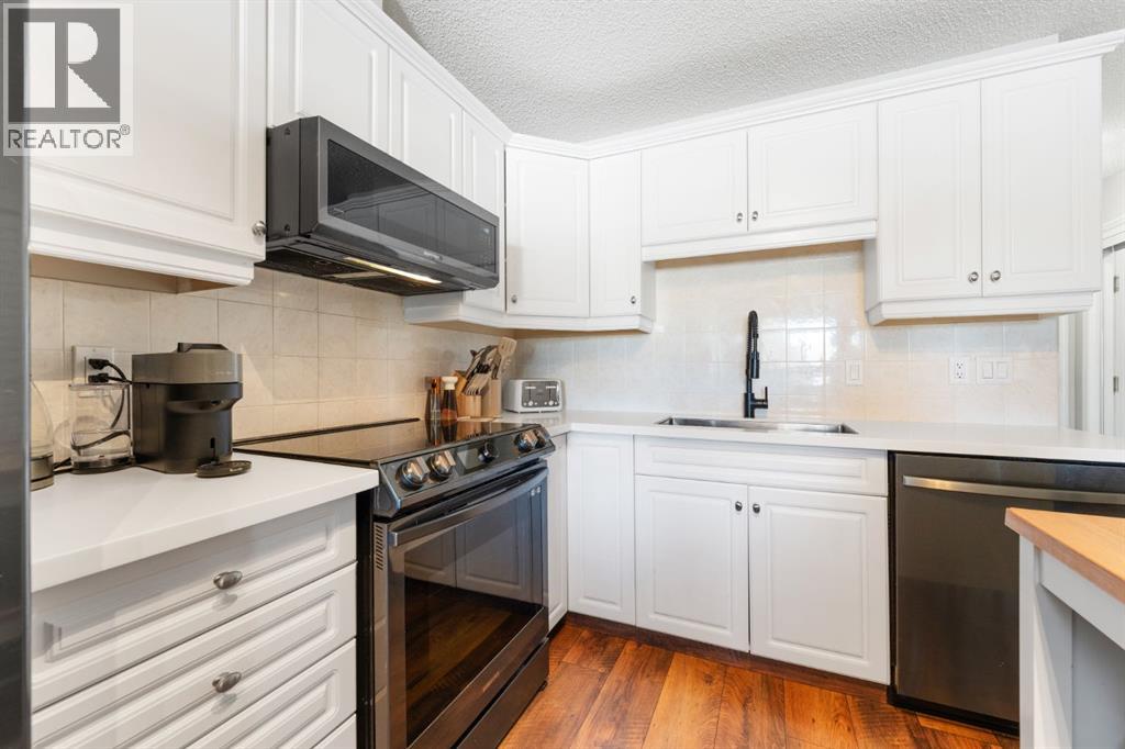 203, 6148 Bowness Road Nw, Calgary, Alberta  T3B 0E1 - Photo 2 - A2288648