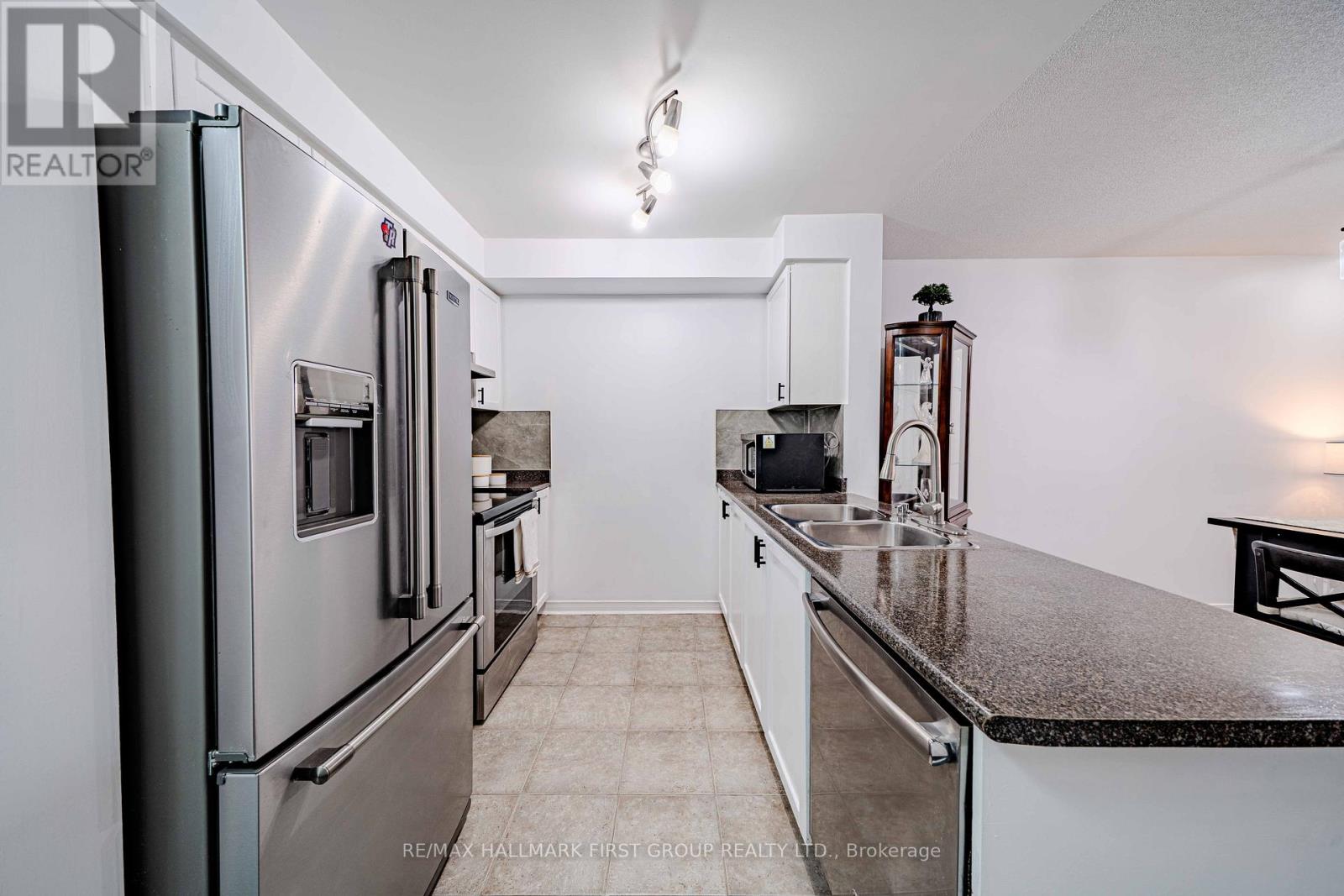 1 - 84 Petra Way, Whitby, Ontario  L1R 0A3 - Photo 11 - E12893746