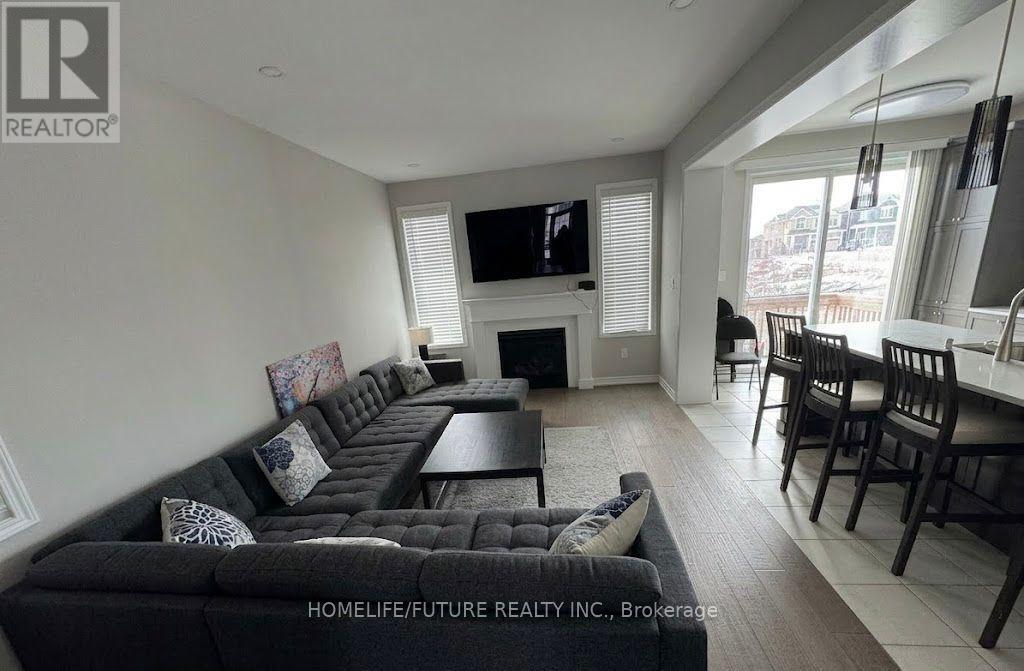 143 Yates Drive, Milton, Ontario  L9E 1S7 - Photo 4 - W12893876