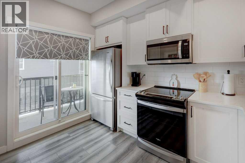 703, 115 Sagewood Drive Sw, Airdrie, Alberta  T4B 4V6 - Photo 4 - A2281530