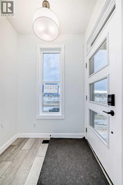 21258 Sheriff King Street Sw, Calgary, Alberta  T2X 5M6 - Photo 3 - A2288067