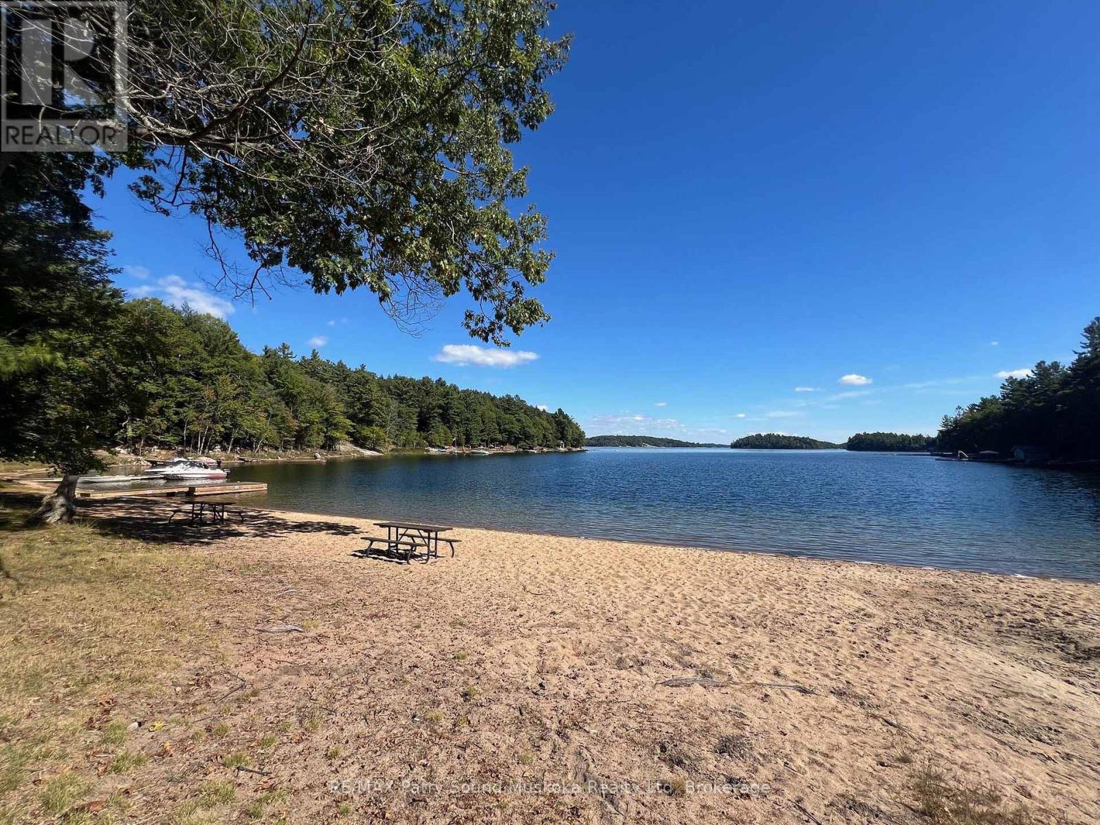 46 Ridgeway Drive, Carling, Ontario  P0G 1G0 - Photo 9 - X12894948