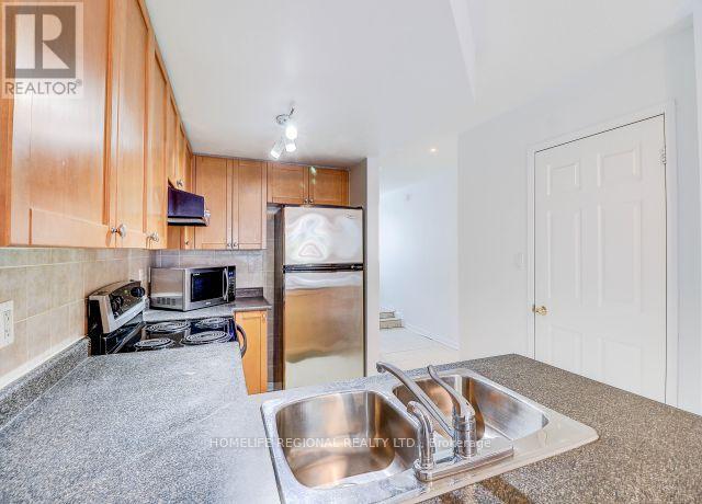 120 - 75 Turntable Crescent, Toronto, Ontario  M6H 4K8 - Photo 13 - W12894700