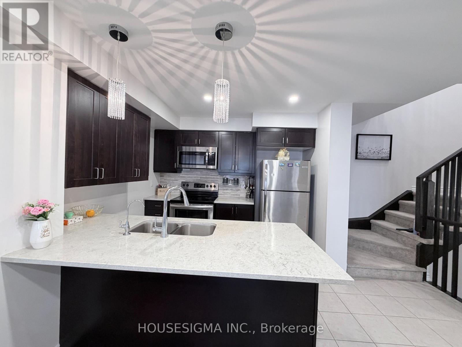 50 - 1222 Rose Way, Milton, Ontario  L9E 1P1 - Photo 7 - W12894868