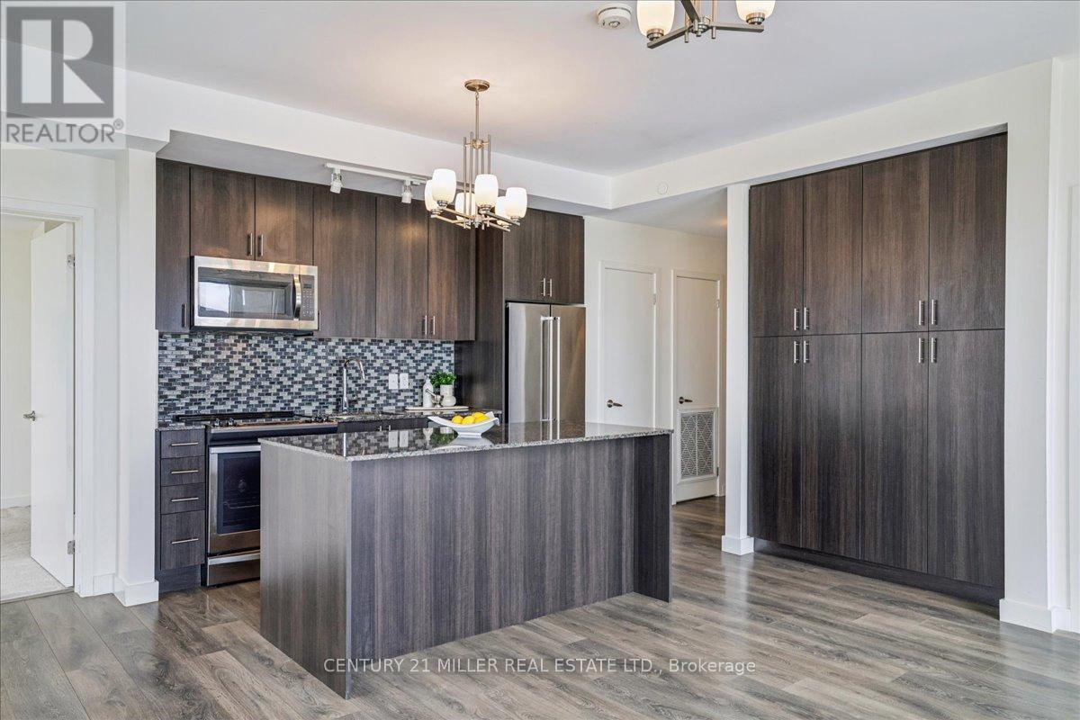 305 - 150 Sabina Drive, Oakville, Ontario  L6H 0W3 - Photo 14 - W12895240