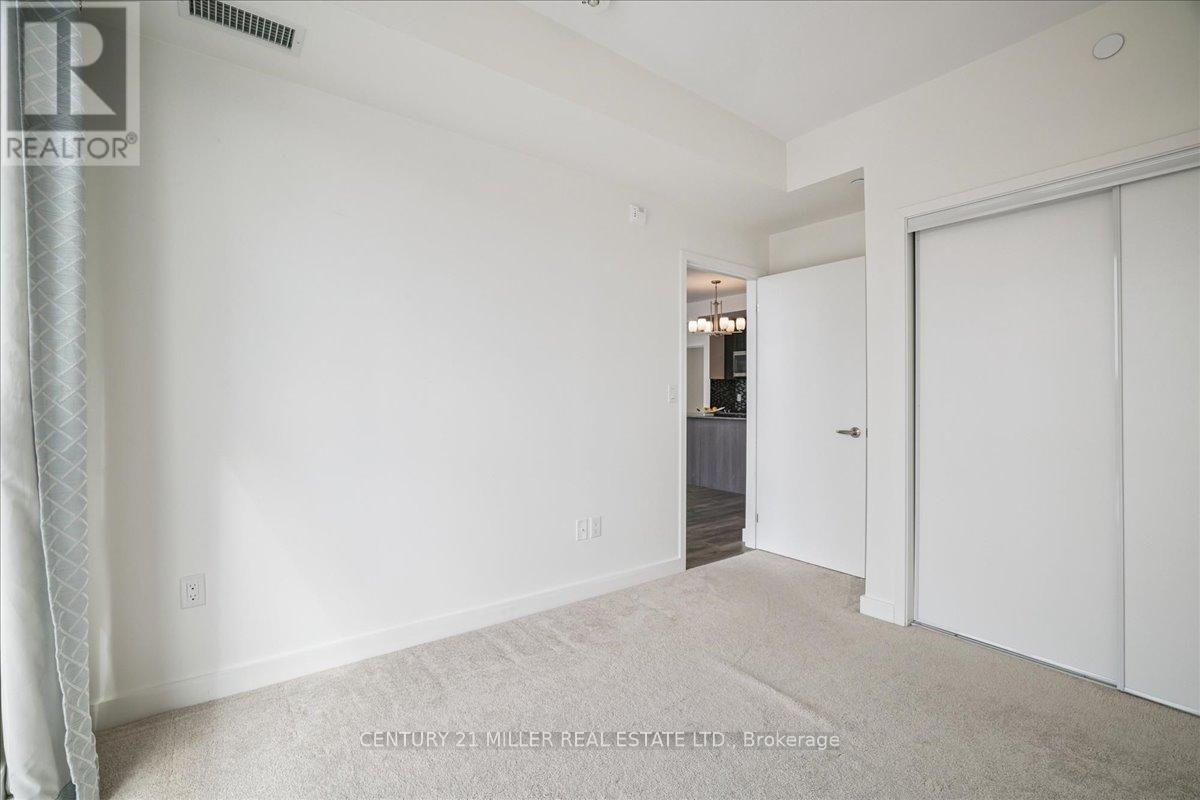 305 - 150 Sabina Drive, Oakville, Ontario  L6H 0W3 - Photo 24 - W12895240