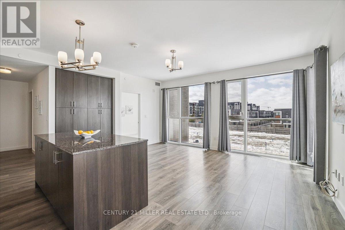 305 - 150 Sabina Drive, Oakville, Ontario  L6H 0W3 - Photo 9 - W12895240