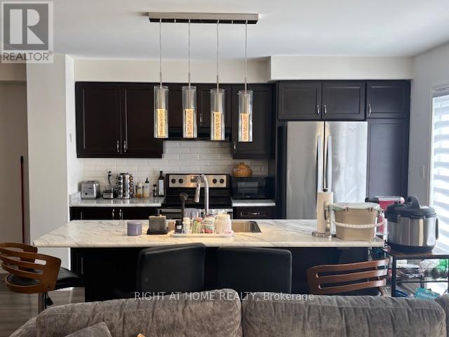 1654 Copeland Circle, Milton, Ontario  L9T 8X8 - Photo 3 - W12895430