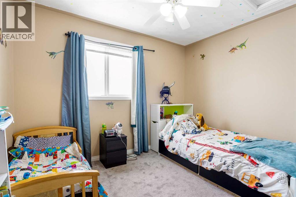 31 Ross Place, Crossfield, Alberta  T0M 0S0 - Photo 18 - A2292693