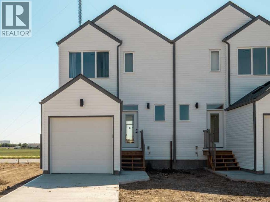 689 Blackwolf Boulevard N, Lethbridge, Alberta  T1H 7H7 - Photo 3 - A2211295