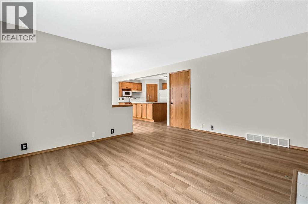 23 Sunset Crescent, Okotoks, Alberta  T1S 1P3 - Photo 12 - A2291099