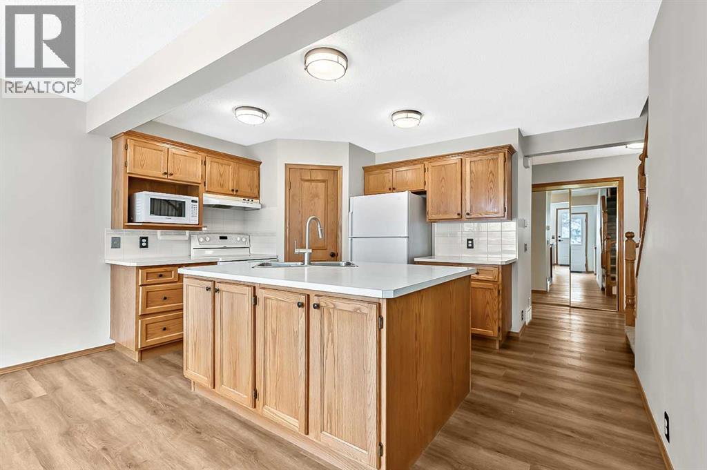 23 Sunset Crescent, Okotoks, Alberta  T1S 1P3 - Photo 7 - A2291099