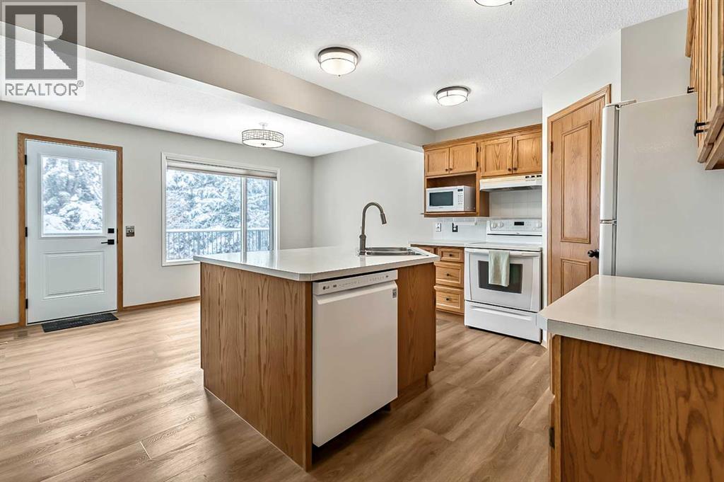 23 Sunset Crescent, Okotoks, Alberta  T1S 1P3 - Photo 6 - A2291099