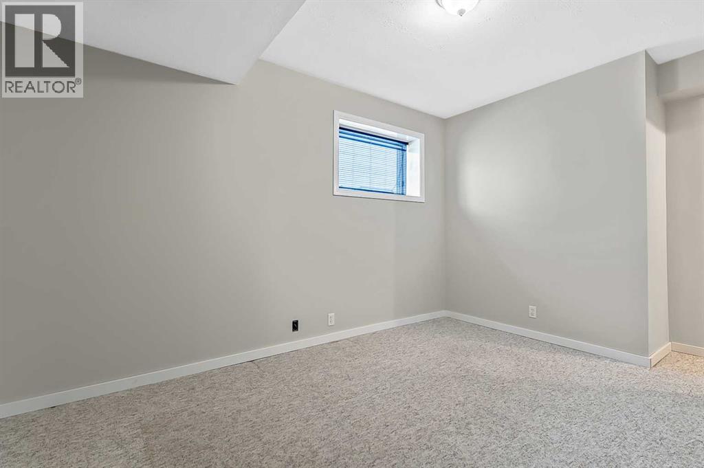 23 Sunset Crescent, Okotoks, Alberta  T1S 1P3 - Photo 28 - A2291099
