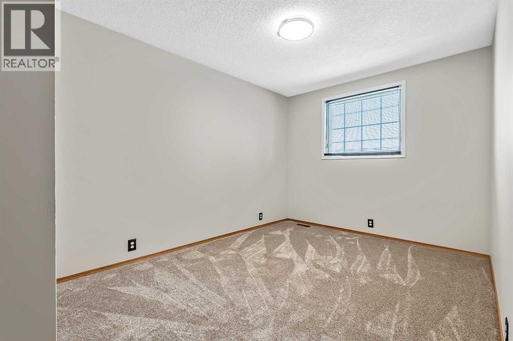 23 Sunset Crescent, Okotoks, Alberta  T1S 1P3 - Photo 22 - A2291099