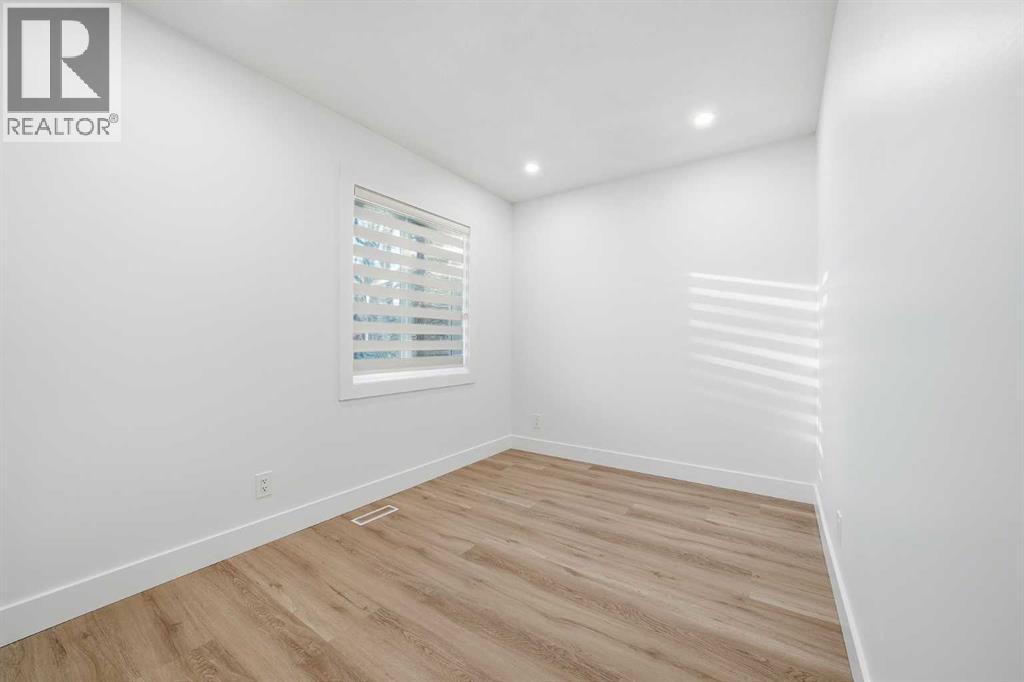 304 Huntbourne Hill Ne, Calgary, Alberta  T2K 3Y4 - Photo 20 - A2278014