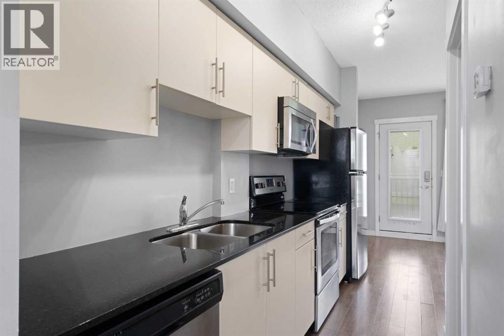402, 1740 9 Street NW, Calgary, Alberta  T2M 4Z5 - Photo 4 - A2274422