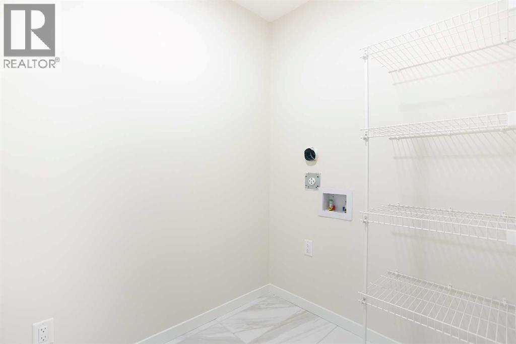 53 Creekside Passage SW, Calgary, Alberta  T2X 5V6 - Photo 23 - A2279223