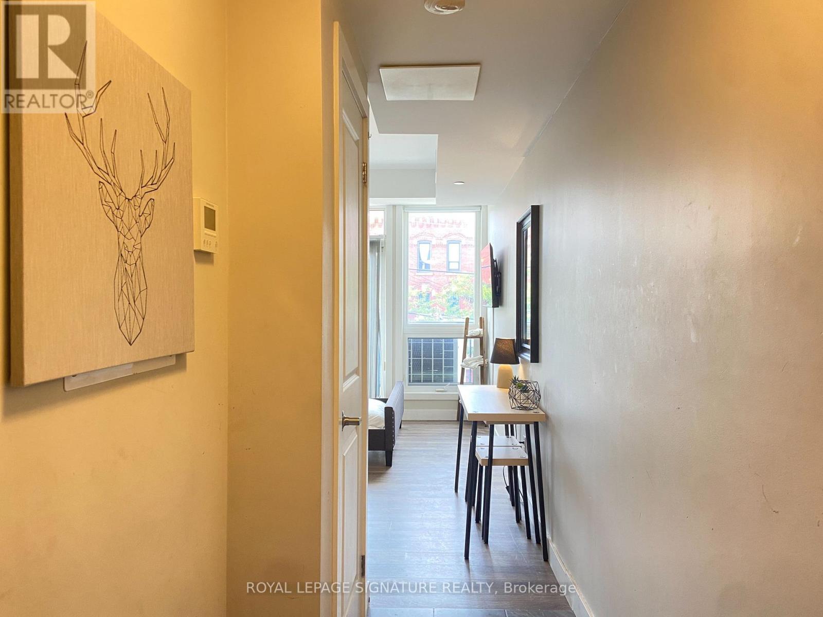 202 - 335 College Street, Toronto, Ontario  M5T 1S2 - Photo 1 - C12896760