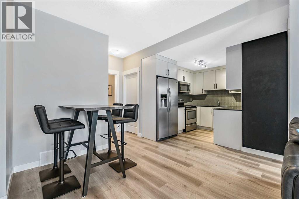 1, 67 West Coach Manor Sw, Calgary, Alberta  T3H 1R7 - Photo 6 - A2273949