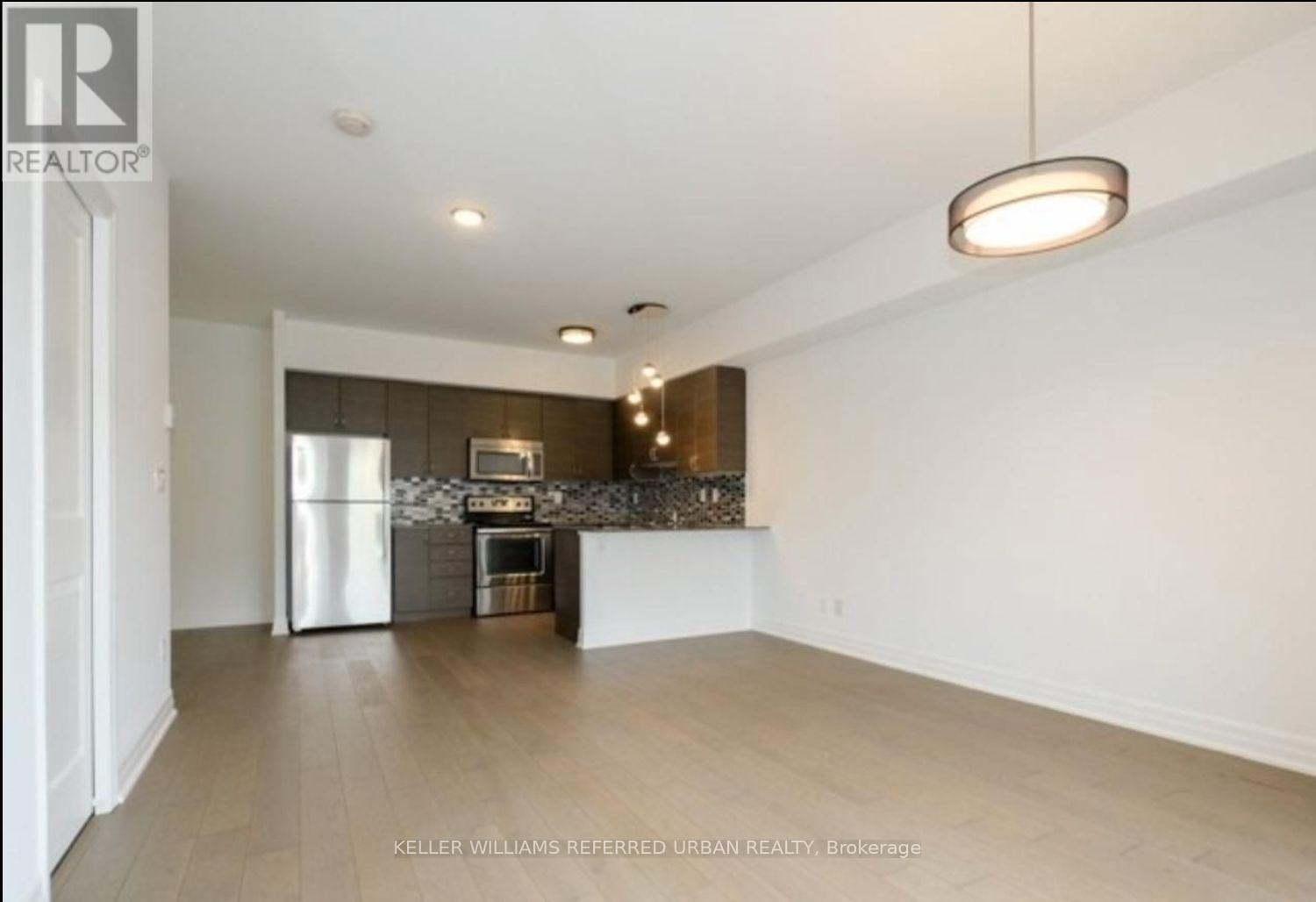 202 - 47 Macaulay Avenue, Toronto, Ontario  M6P 3P2 - Photo 2 - W12888694