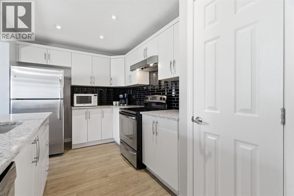 405 Windstone Grove Sw, Airdrie, Alberta  T4B 2P9 - Photo 11 - A2292789