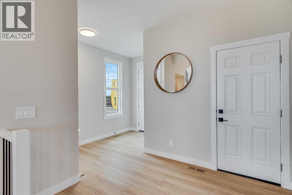 467 Kinniburgh Loop, Chestermere, Alberta  T1X 3C2 - Photo 3 - A2292043