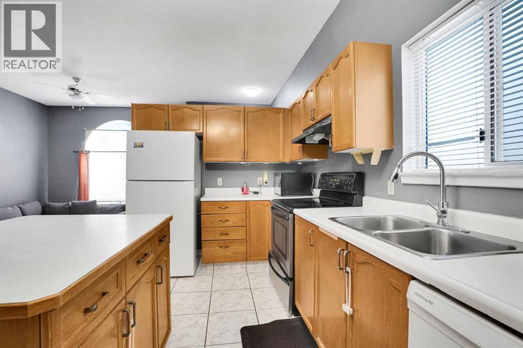 6934 Laguna Way Ne, Calgary, Alberta  T1Y 6W2 - Photo 10 - A2277480