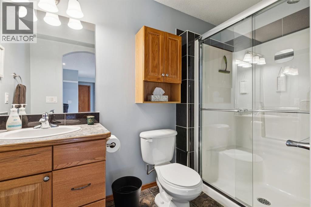 2841 Coopers Manor SW, Airdrie, Alberta  T4B 3J7 - Photo 35 - A2286155