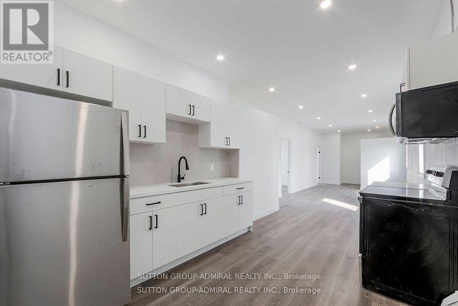 Upper 2 - 1930 Queen Street E, Toronto, Ontario  M4L 1H6 - Photo 10 - E12897194