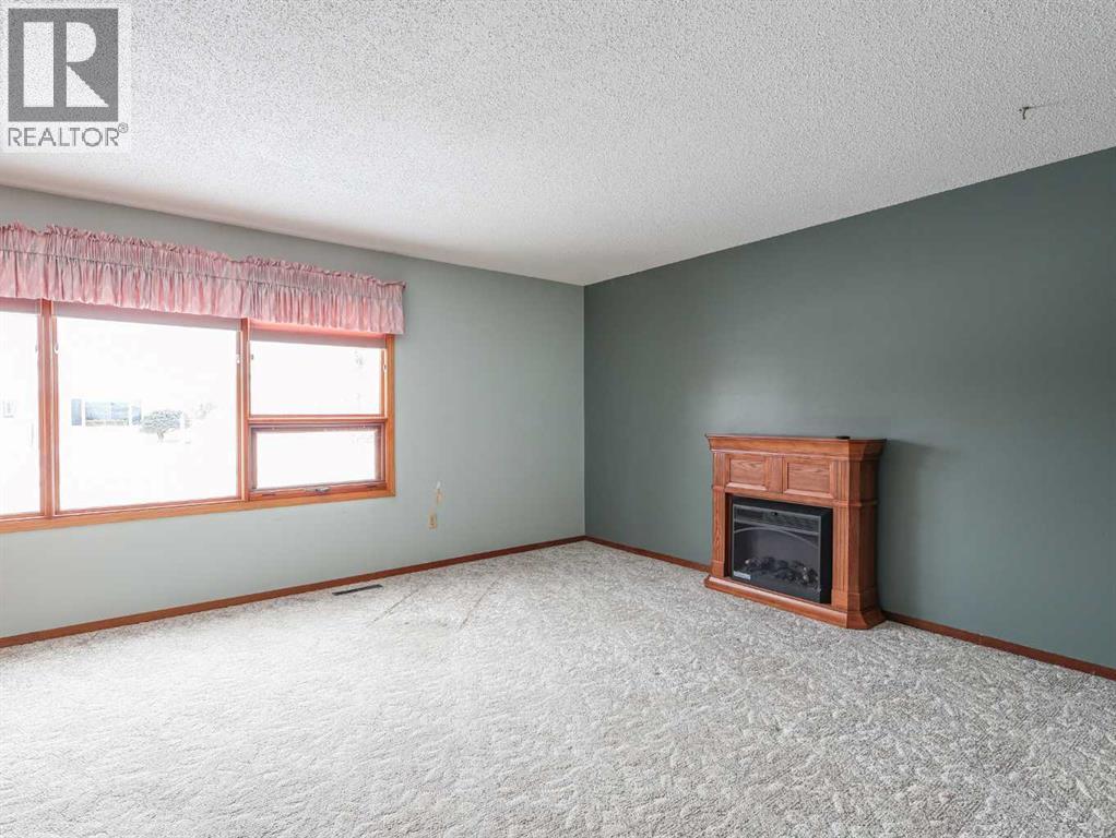 5718 40 Avenue, Stettler, Alberta  T4K 1H6 - Photo 3 - A2290132