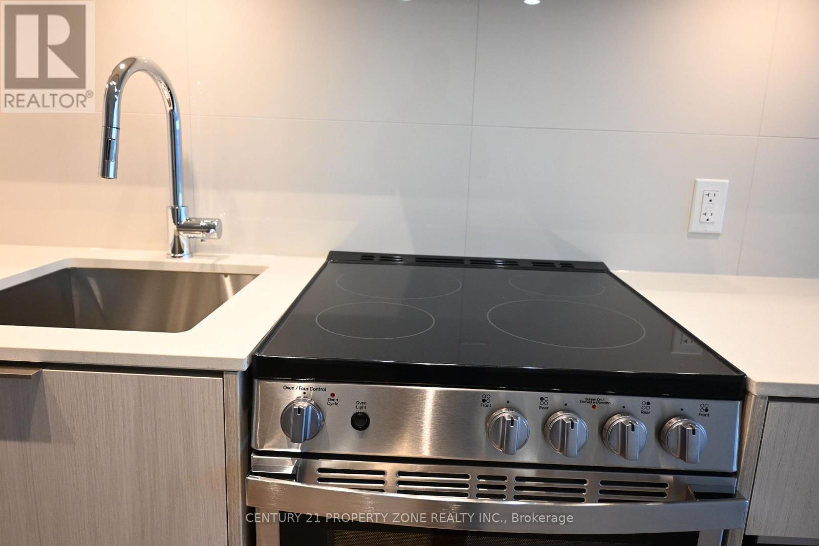 418 - 448 Burnhamthorpe Road W, Mississauga, Ontario  L5B 4M6 - Photo 8 - W12897394