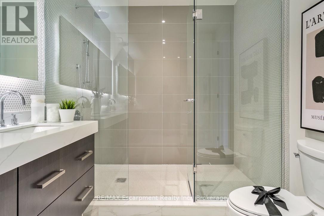 105 - 123 Maurice Drive, Oakville, Ontario  L6K 2W6 - Photo 34 - W12883006