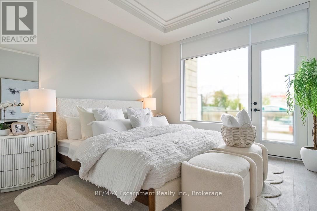 105 - 123 Maurice Drive, Oakville, Ontario  L6K 2W6 - Photo 30 - W12883006