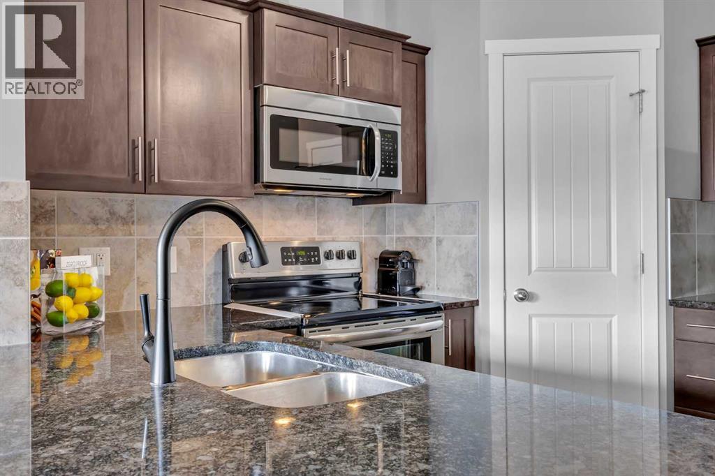 15 Copperpond Landing Se, Calgary, Alberta  T2Z 1G6 - Photo 8 - A2288713