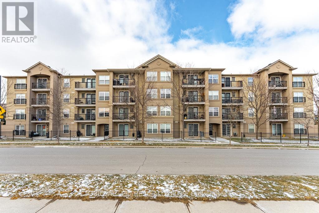 309 - 1370 Main Street E, Milton, Ontario  L9T 7S8 - Photo 1 - W12897508