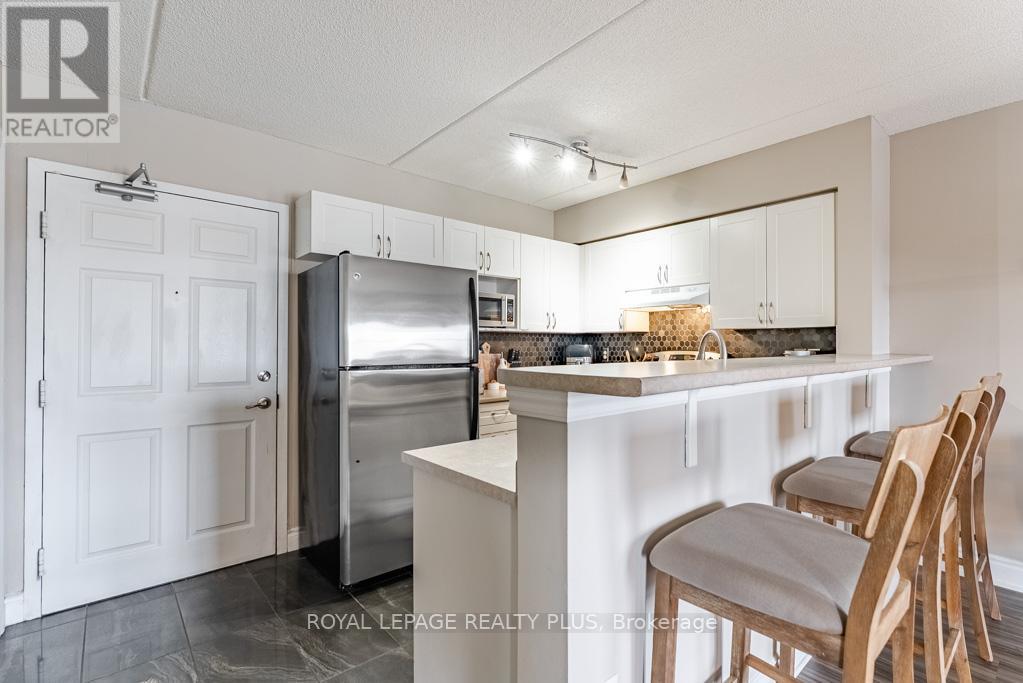 309 - 1370 Main Street E, Milton, Ontario  L9T 7S8 - Photo 4 - W12897508