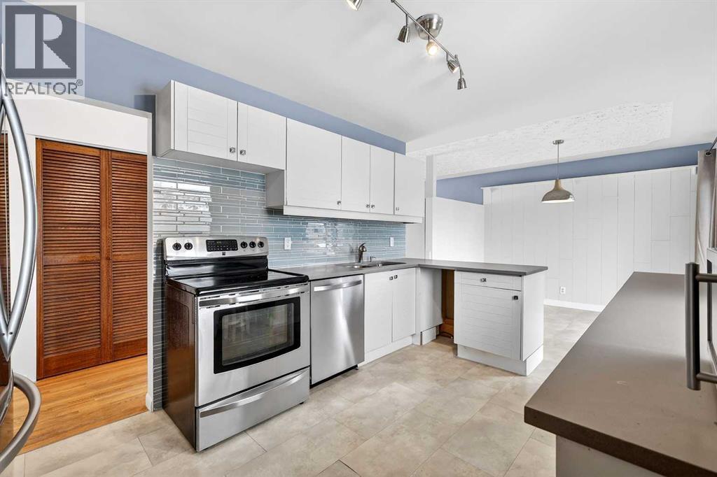 79 Hillary Crescent Sw, Calgary, Alberta  T2V 5J3 - Photo 9 - A2294116